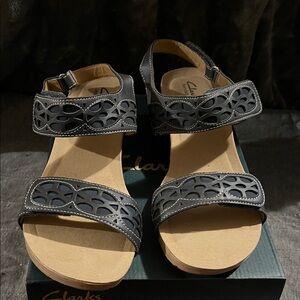 Clarks Women's Sandals with Black Straps and Tan Sole